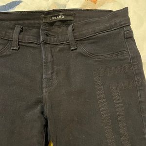 JBrand black skinny low rise jeans with embroidery detail. Size 25